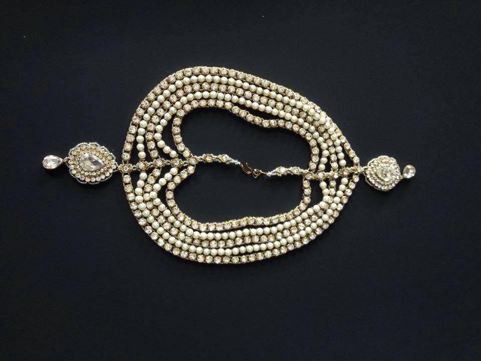 Tikka with Perls and White Stones